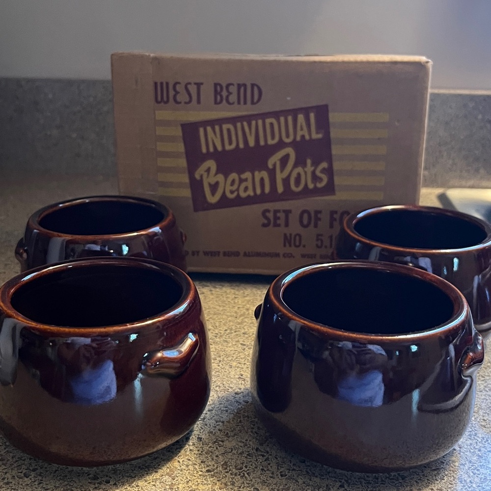 Vintage set of four West Bend bean pots. No. 5.109 with original box.